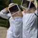Beekeepers in Protective Gear