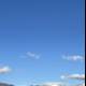 Kite soaring over picturesque Santa Fe hill