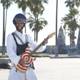 Turbaned Guitarist Shreds by the Palm Trees
