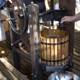 Crafting Homemade Wine in a Wooden Barrel