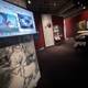 Art Enthusiasts Admiring the Painting Display at Walt Disney Museum