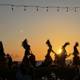 Silhouettes of Hula Dancers at Sunset on the Beach