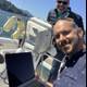 Two Men on a Laptop-Filled Yacht