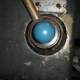 Blue Sphere on Metal Object