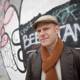 Junkie XL Poses in Front of Graffiti Wall