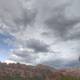 Cloudy Skies over Sedona's Majestic Landscape