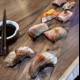 Savoring Sushi on a Beautiful Wooden Board