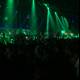 Green Spotlight on Euphoric Crowd at Rock Concert
