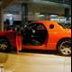 Bold and Beautiful: A Stunning Orange Sports Car at the LA Auto Show