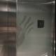 Elevator Handprint