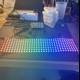 Multicolored LED Display Illuminating a Modern Desk